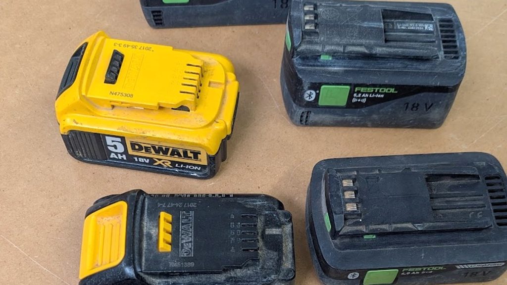 DeWalt and Festool 18V battery packs side by side showing different Ah ratings