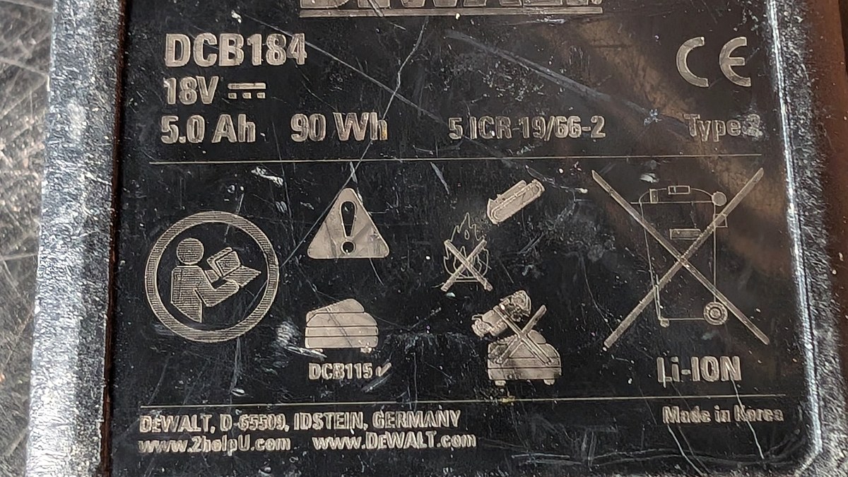 DeWalt DCB184 battery label showing 18V, 5.0Ah and 90Wh
