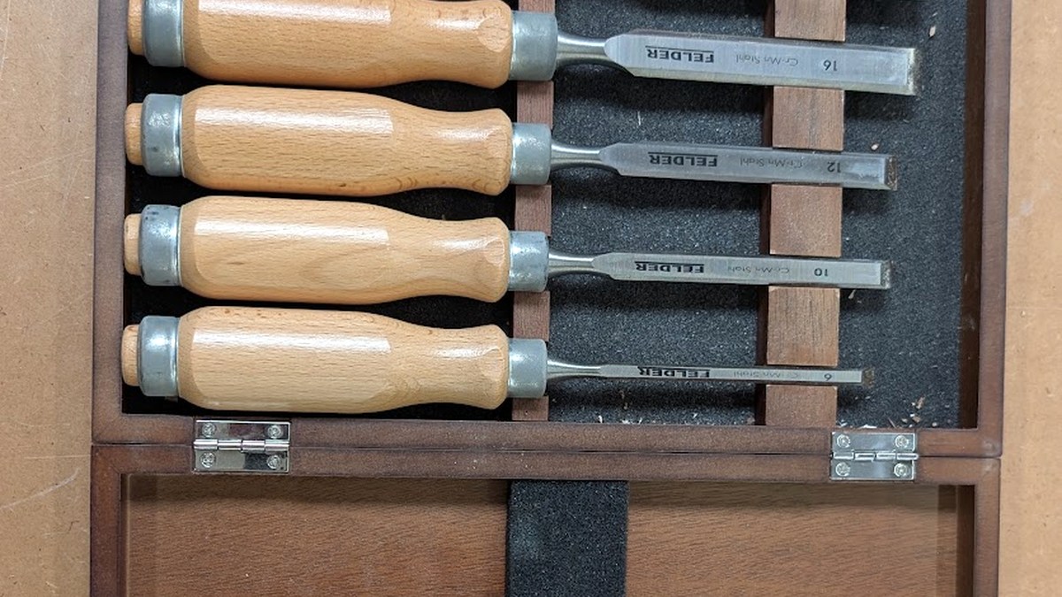 Boxed set of bevel-edge chisels for a carpentry apprentice tool kit