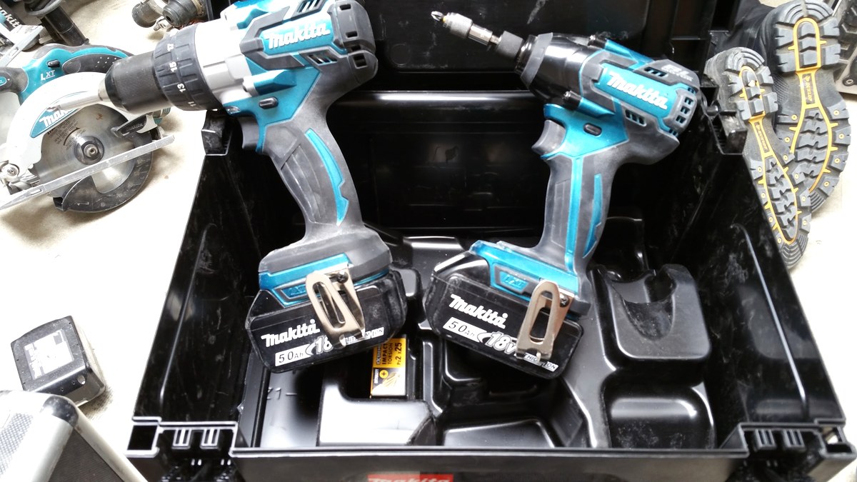 Cordless combi drill and impact driver twin kit with two 5.0Ah batteries in a MakPac case