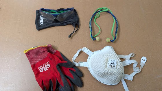 PPE essentials: safety glasses, ear plugs, gloves and a dust mask