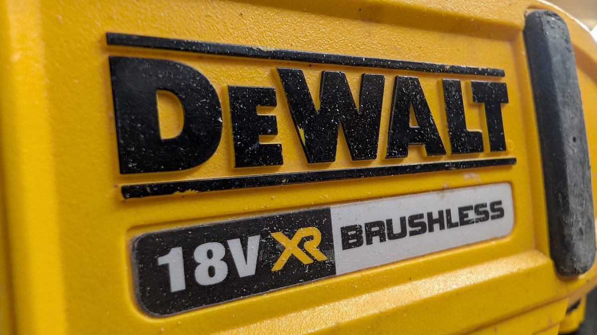 The 18V XR Brushless badge moulded into the yellow body of a DeWalt cordless tool